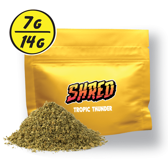 A yellow bag of Shred 7 or 14 gram Tropic Thunder pre-milled flower.