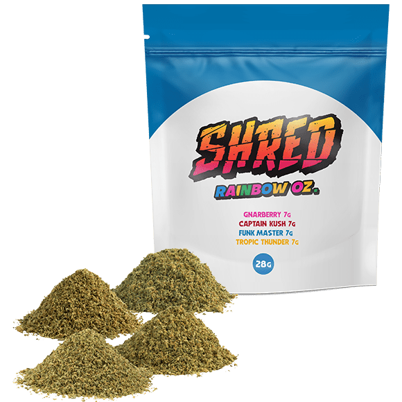 A bag of Shred Rainbow Ounce with four piles of pre-milled flower.