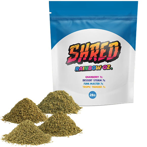 A bag of Shred Rainbow Ounce with four piles of pre-milled flower.