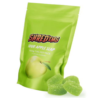 A green bag of Shred'ems Apple Slap gummies.