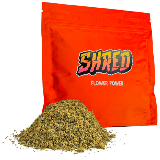 A bright orange-red bag of Shred Flower Power.