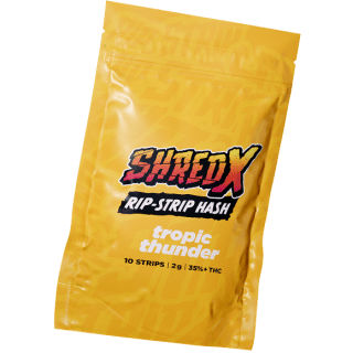 A yellow bag of Shred-X Tropic Thunder Rip Strip Hash.